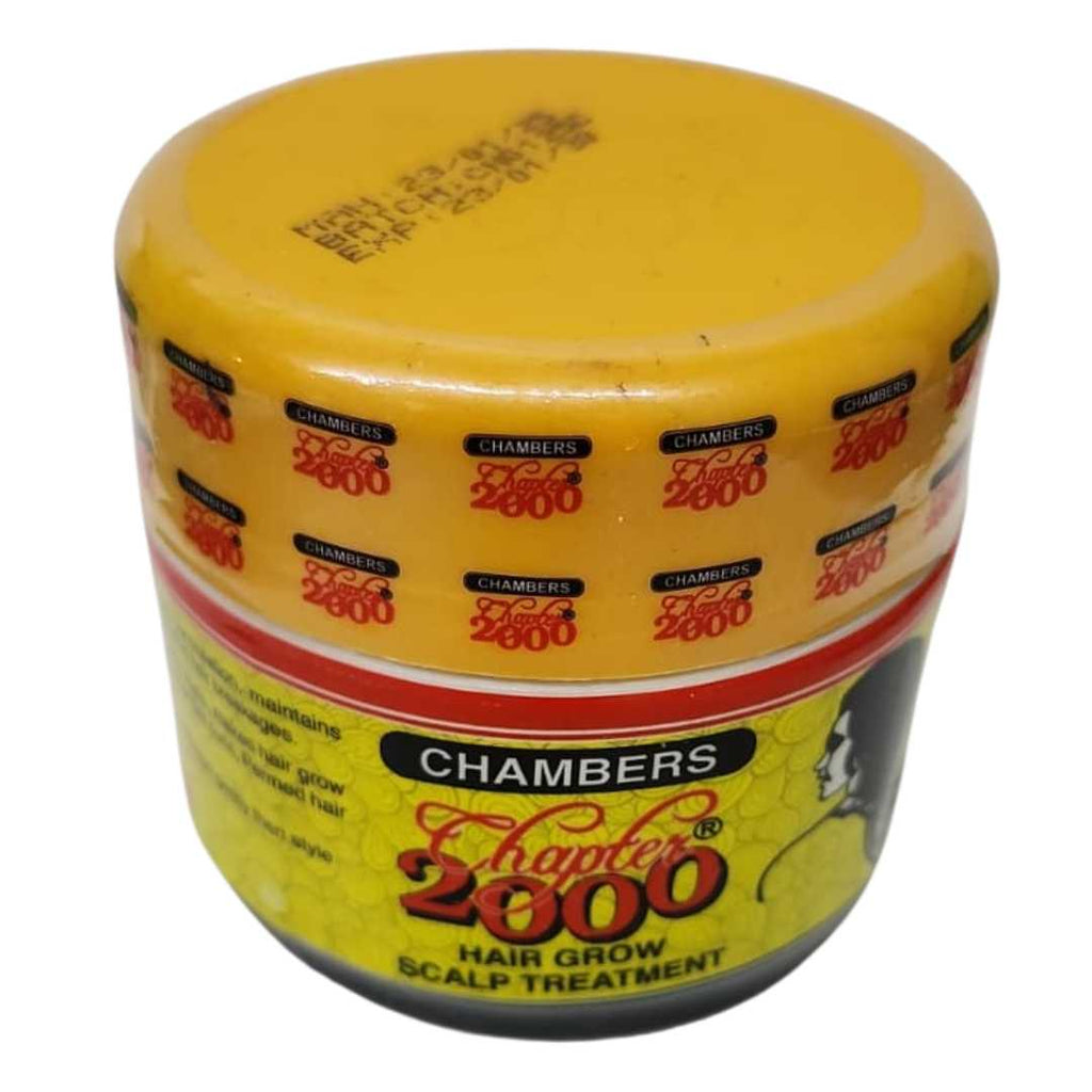 Small yellow container of CHAMBERS Chapter 2000 Hair Grow Scalp Treatment, featuring red and black branding and a sealed yellow lid with repeated “Chapter 2000” logos.