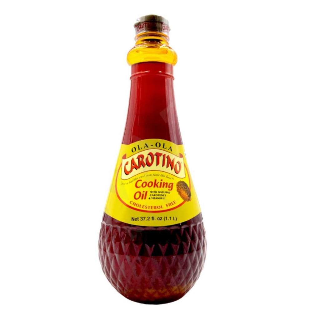 Bottle of Carotino Palm Cooking Oil labeled "Cholesterol Free" with red and yellow packaging.
