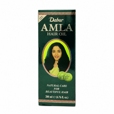Dabur Amla Hair Oil, nourishing hair care oil enriched with amla extract, designed to moisturize the scalp, condition hair, and leave it looking smooth, shiny, and healthy.