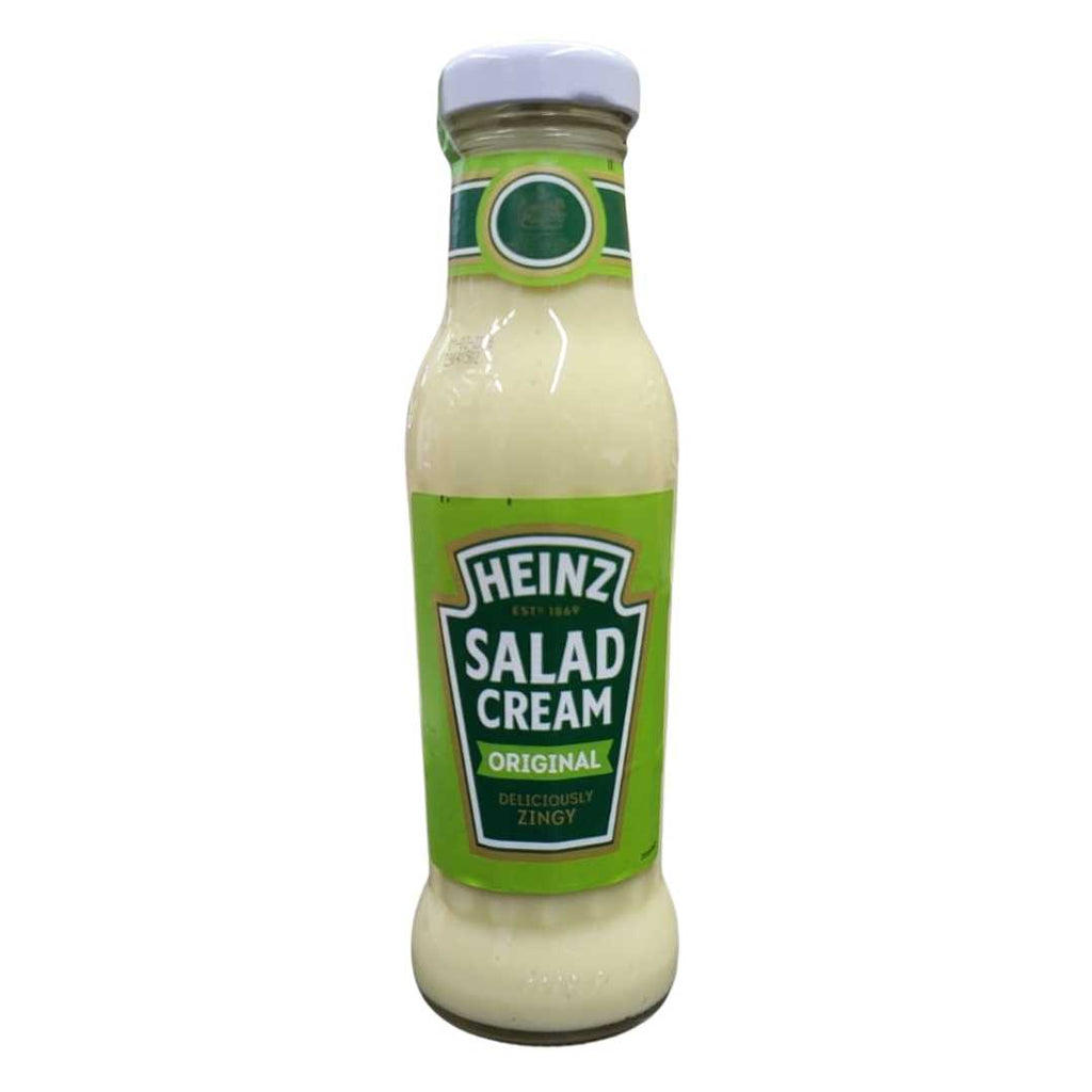 Heinz Salad Cream Original – Bottle of creamy, tangy salad dressing with a green label, placed on a white surface.