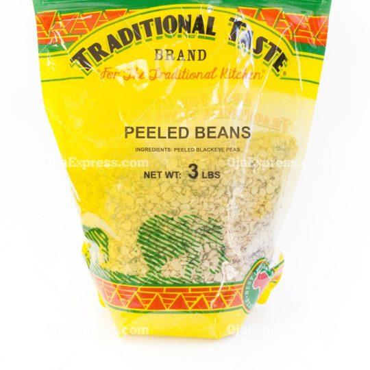 A 3-pound package of Traditional Taste Peeled Beans, showing smooth, light-colored peeled beans ready for cooking, displayed on a rustic wooden surface.