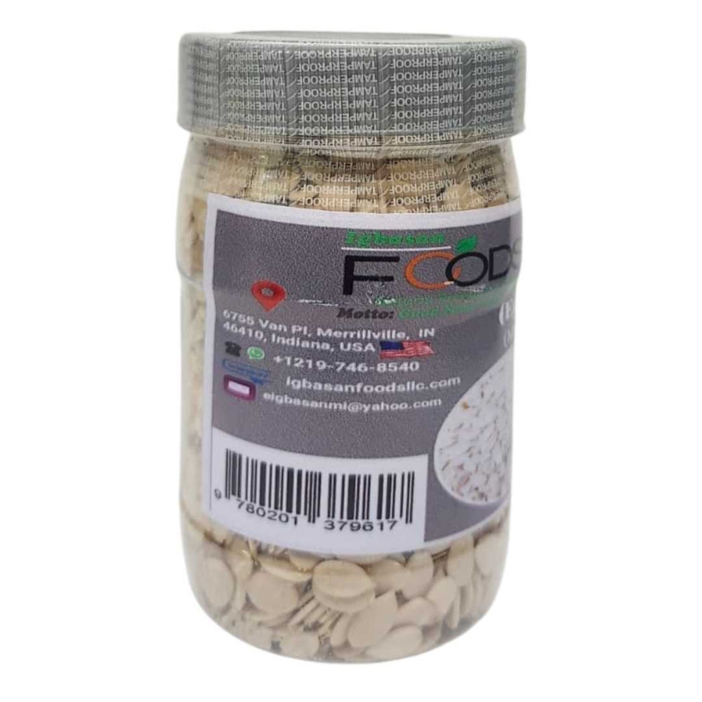 Clear plastic jar filled with whole Egusi (melon) seeds from Igbasan Foods. The jar has a grey tamper-proof seal and a front label showing the brand logo and an image of shelled melon seeds in a bowl.