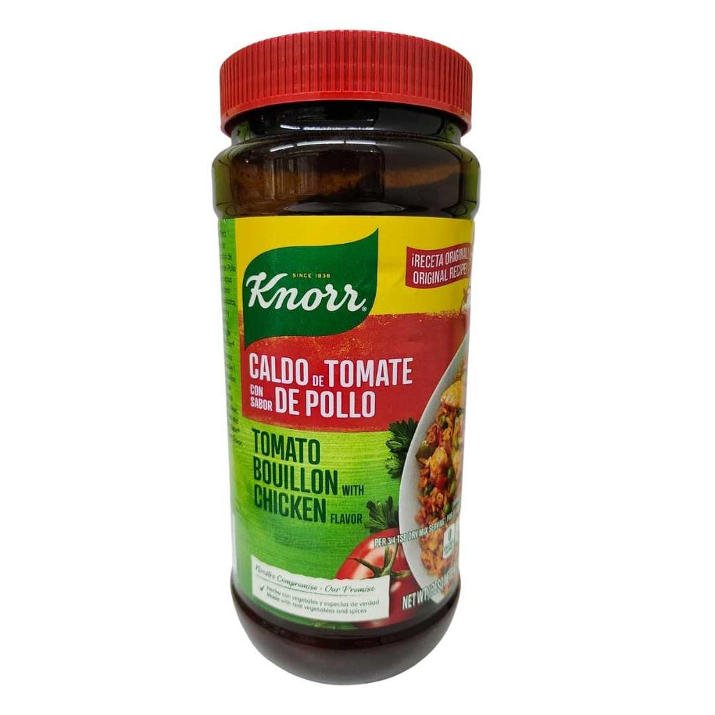 Knorr Caldo de Tomate con Sabor de Pollo (Tomato Bouillon with Chicken Flavor) 40.5 oz jar with a red cap, green and red label, and image of a rice dish with vegetables and chicken.