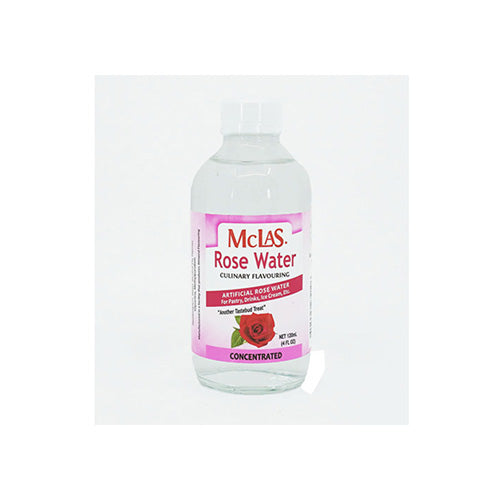 Clear glass bottle of McLas Rose Water Culinary Flavouring (120 ml / 4 fl oz) with a white cap and pink label. The label features a red rose illustration and text reading “Artificial Rose Water – For Pastry, Drinks, Ice Cream, etc.” The product is concentrated and intended for culinary use.