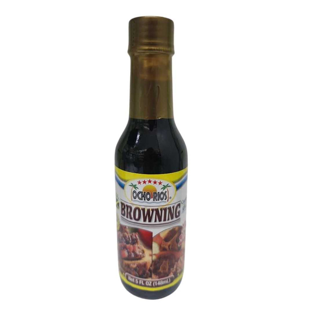 Bottle of Ocho Rios Browning (5 fl oz / 148 ml) with a gold cap and a label showing the Ocho Rios logo, food images of stewed meats, and the text “Caribbean Browning.” The dark liquid inside highlights its use for cooking and flavoring.