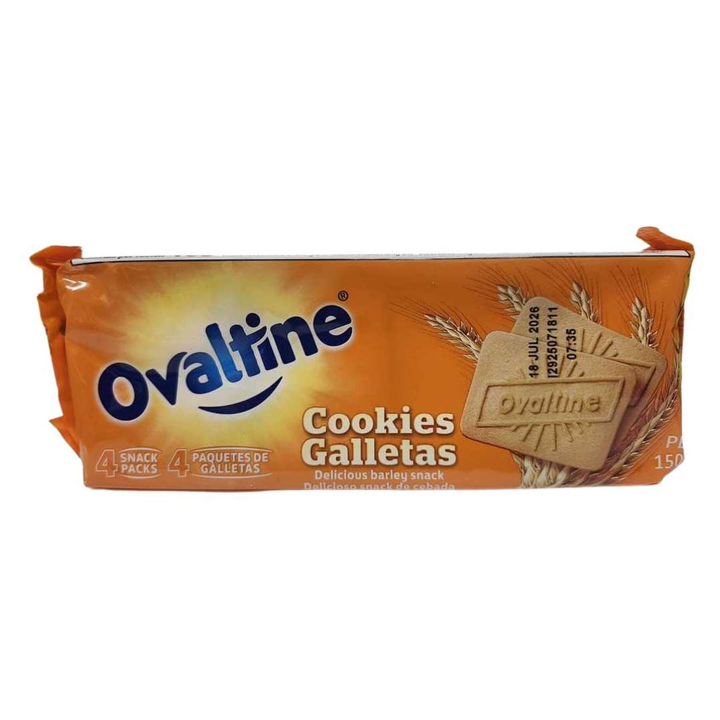 Package of Ovaltine Cookies (150 g) in bright orange packaging. The label features two rectangular cookies embossed with the “Ovaltine” logo, wheat graphics in the background, and text in English and Spanish reading “Cookies / Galletas.” The package highlights “4 snack packs” and the expiration date “18 JUL 2026.”