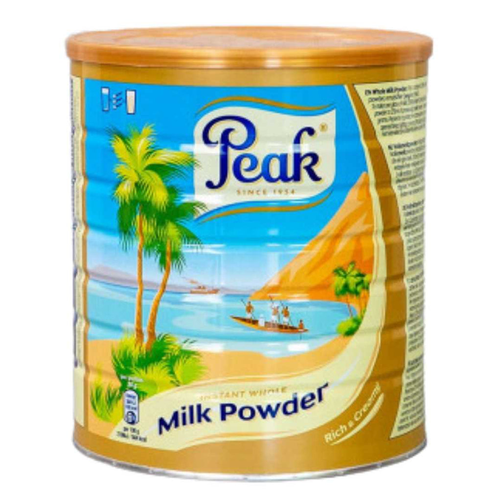 900g tin of Peak Dry Whole Milk powder, rich and creamy full cream milk for drinking, cooking, and baking.