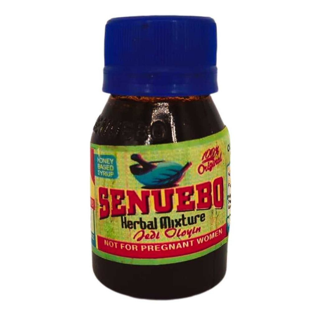 A small bottle of SENUEDO Herbal Mixture with a blue cap and a green label. The label reads 'SENUEBO Herbal Mixture Ise Oloyin,' and includes warnings such as 'Honey Based Syrup,' '100% Original,' and 'Not for Pregnant Women.