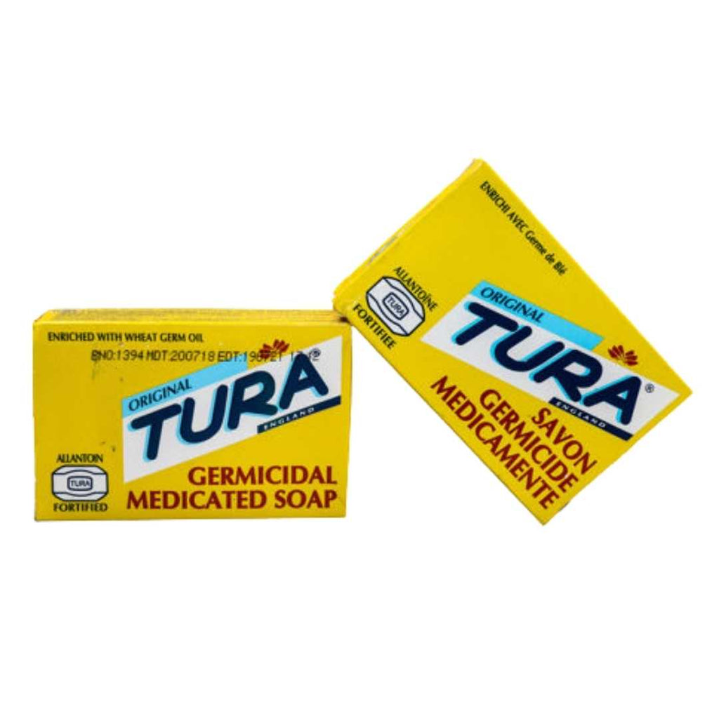 Tura Germicidal Medicated Soap 65g bar in white and blue packaging, designed to help treat skin conditions and kill germs.