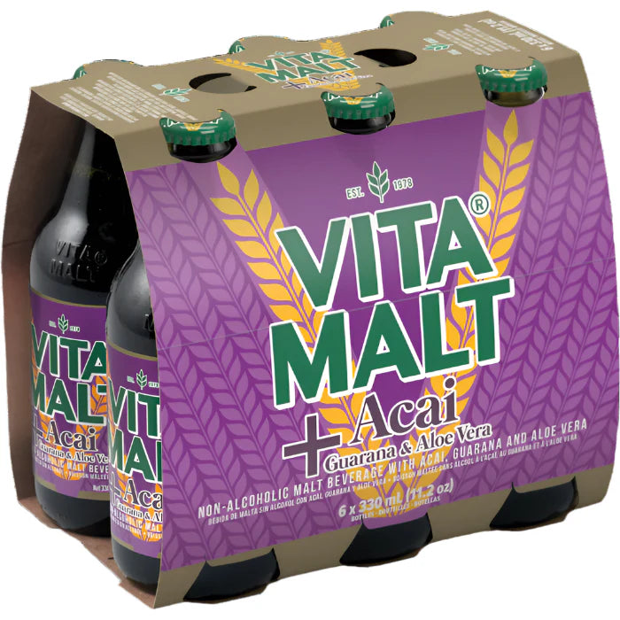 Six-pack of Vita Malt Acai malt beverages, featuring dark purple bottles with acai fruit-themed labeling.