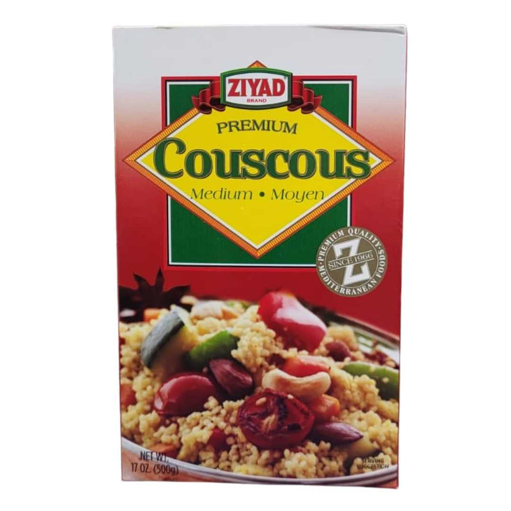 Box of Ziyad Brand Premium Couscous Medium (500g), featuring a serving of couscous with vegetables, nuts, and tomatoes on the packaging.