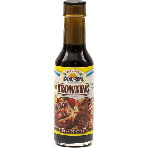 Bottle of Ocho Rios Browning (5 fl oz / 148 ml) with a gold cap and a label showing the Ocho Rios logo, food images of stewed meats, and the text “Caribbean Browning.” The dark liquid inside highlights its use for cooking and flavoring.