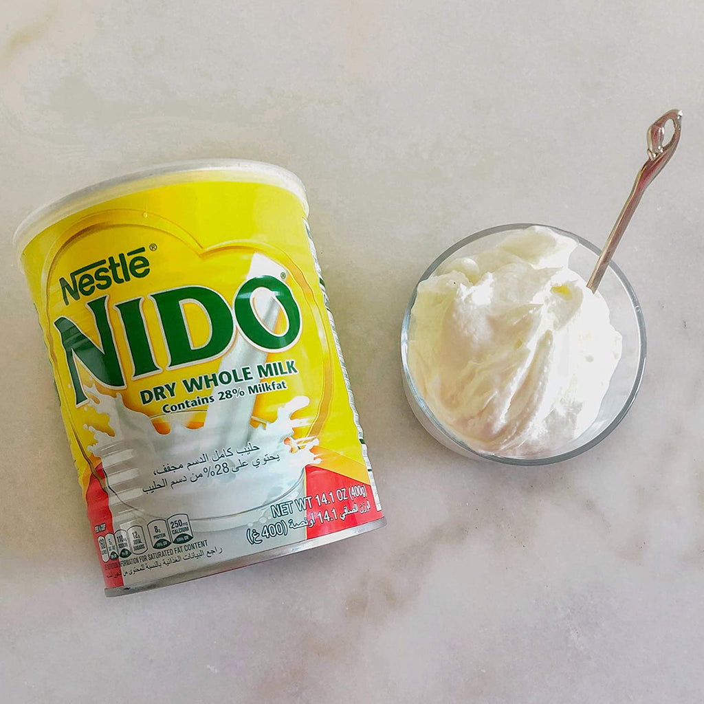 Nestle Nido Milk Powder, Imported from Holland, Specially Formulated, Fortified with Vitamins and Minerals, Easy To Prepare, over 12 months, 14.1 oz - Yado African & Caribbean Market